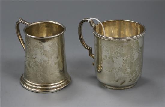 A 1930s silver christening mug and one other silver christening mug.